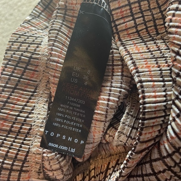 ASOS Design Topshop Petite plisse flared pant in check print - Picture 12 of 12